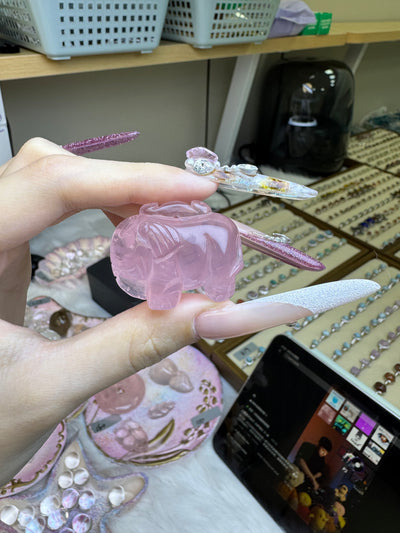 Rose quartz elephant pendant, with dimensions of 36mm × 26mm